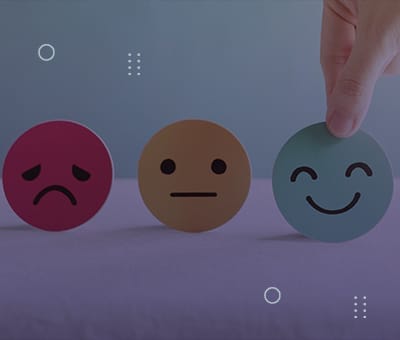 Imagem com carinhas de feliz, triste e neutro, que remetem a satisfação do cliente